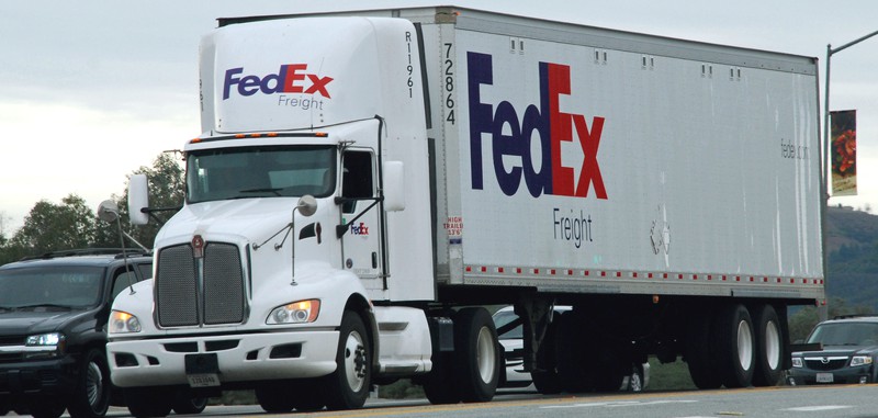 logomarca caminhão transportadora FEDEX